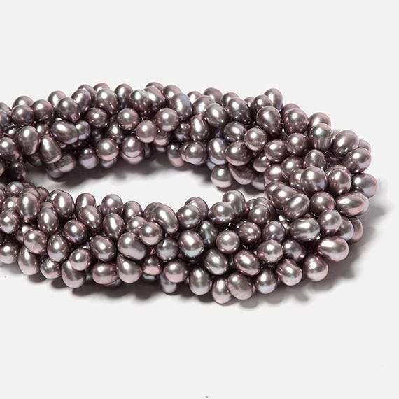 7x5-8x6mm Rose' Silver Top Drilled Oval Freshwater Pearl 16 inch 86 pieces (ONLINE ORDER ONLY)
