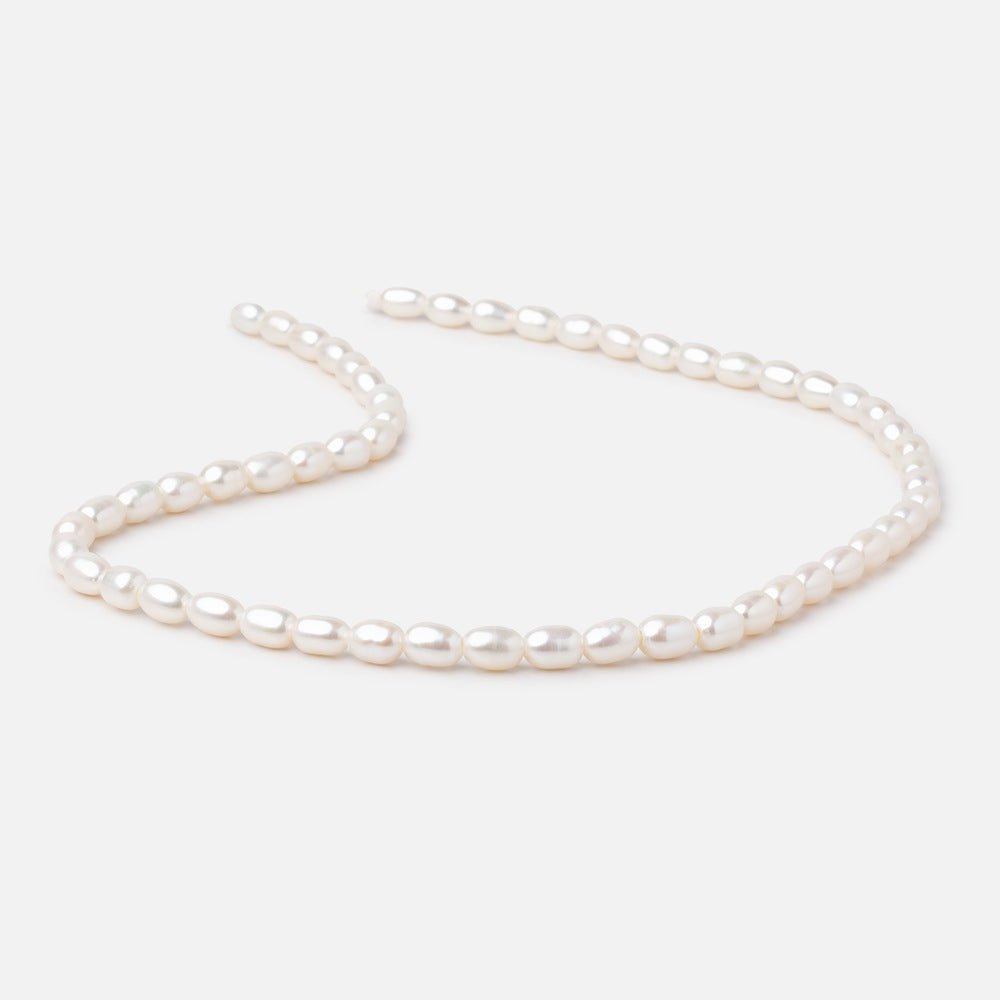 5x7mm Cream 1.5mm Large Hole Oval Freshwater Pearls 16 inch 56 pieces (ONLINE ORDER ONLY)