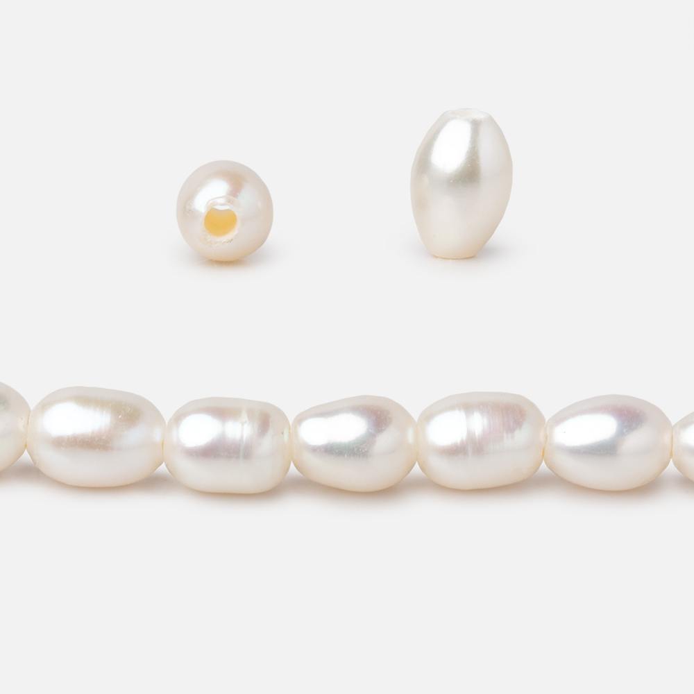 5x7mm Cream 1.5mm Large Hole Oval Freshwater Pearls 16 inch 56 pieces (ONLINE ORDER ONLY)