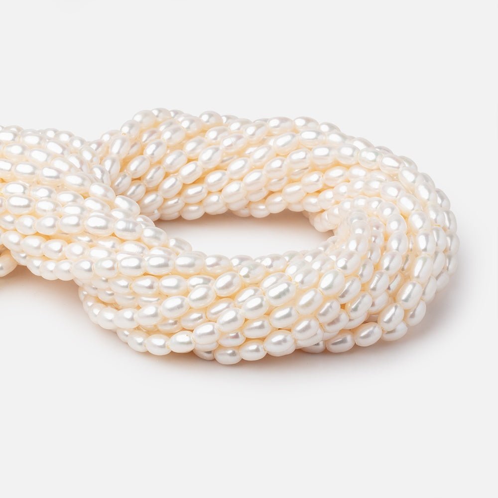 5x7mm Cream 1.5mm Large Hole Oval Freshwater Pearls 16 inch 56 pieces (ONLINE ORDER ONLY)