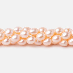 7x5mm Peach Straight Drill Oval Freshwater Pearl 15 inch 56 pcs (ONLINE ORDER ONLY)