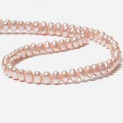 7x5mm Sunset Peach Double Drilled Oval Freshwater Pearls 15.5 inch 76 pieces (ONLINE ORDER ONLY)