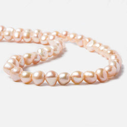 8-10.5mm Dark Salmon Baroque 2.5mm Large Hole Pearls 15 inch 49 pieces (ONLINE ORDER ONLY)