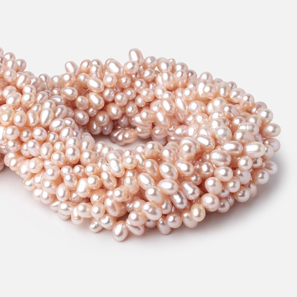 8-9mm Peach Top Drill Oval Freshwater Pearl Beads 15.5 inch 78 pieces (ONLINE ORDER ONLY)