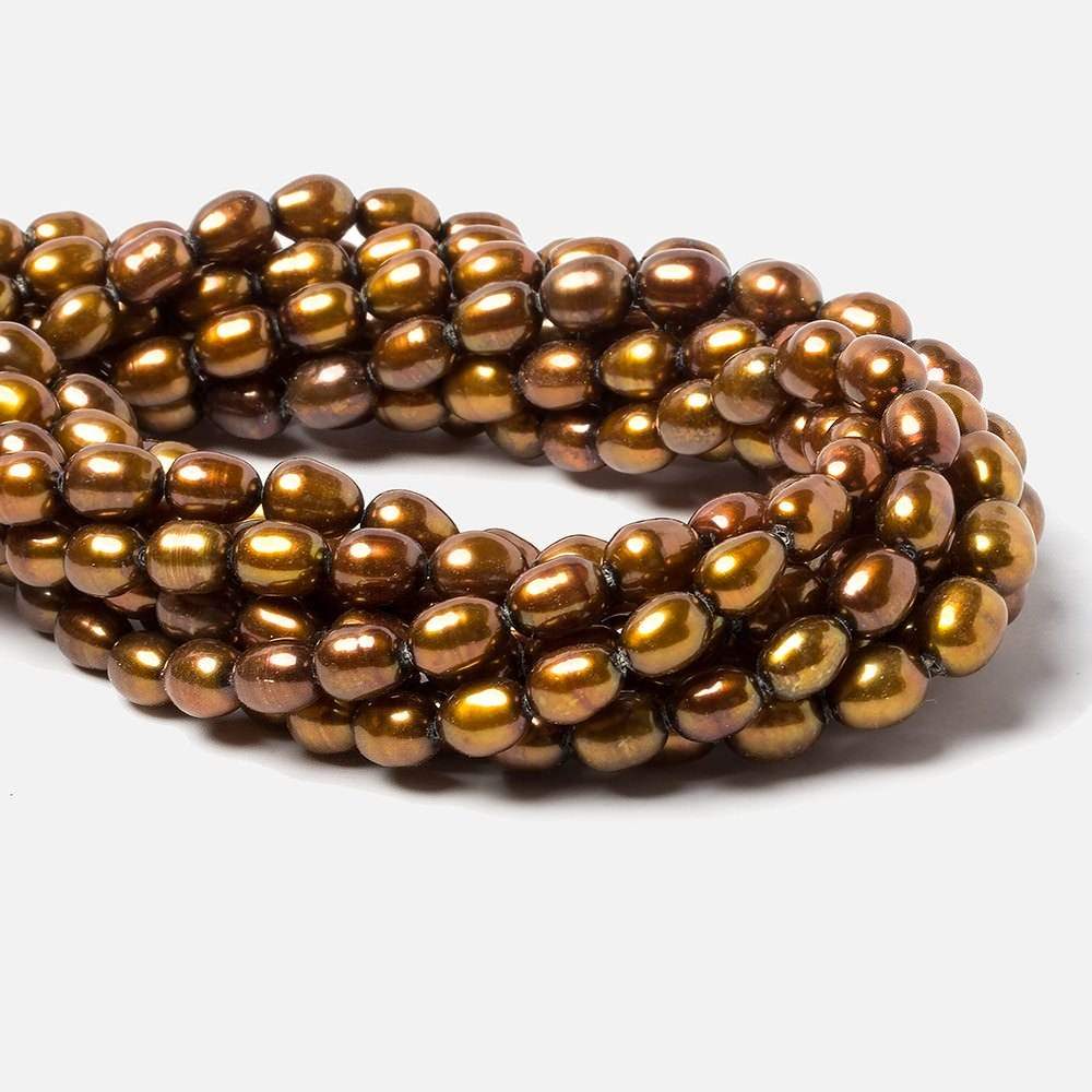 8x5mm Golden straight drilled oval pearls 16 inch 55 pieces (ONLINE ORDER ONLY)