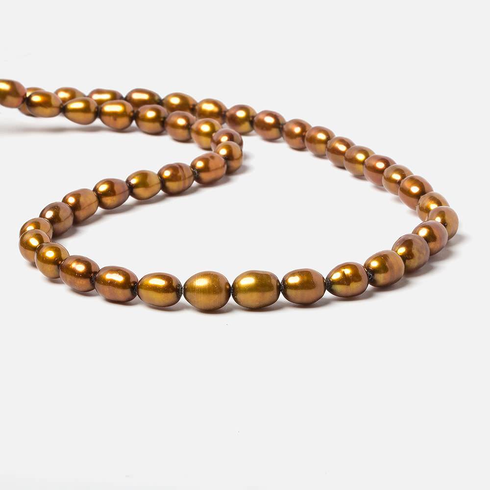 8x5mm Golden straight drilled oval pearls 16 inch 55 pieces (ONLINE ORDER ONLY)