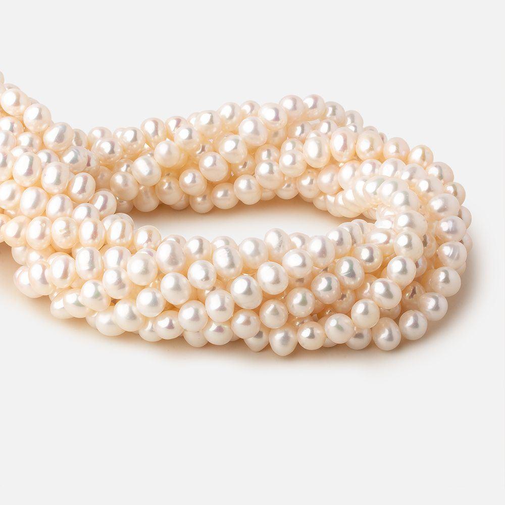 8x7mm Off White side drilled Baroque freshwater pearls 15.5 inch 55 pieces A (ONLINE ORDER ONLY)