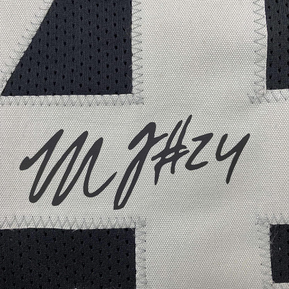 Framed Facsimile Autographed Marshawn Lynch 35x39 Oakland Las Vegas Black Reprint Laser Auto Football Jersey (ONLINE ORDER ONLY)