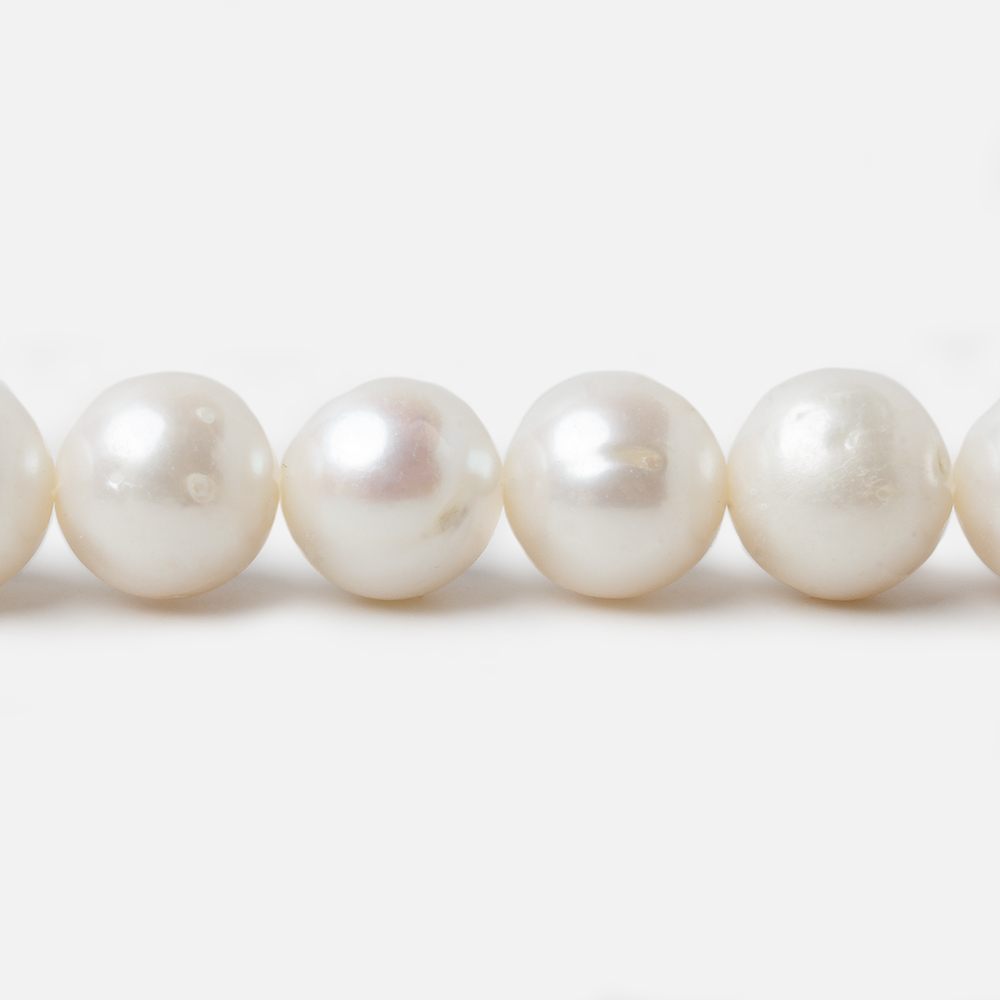 9.5-10.5mm Off White Off Round Freshwater Pearls 15 inch strand 40 pcs (ONLINE ORDER ONLY)