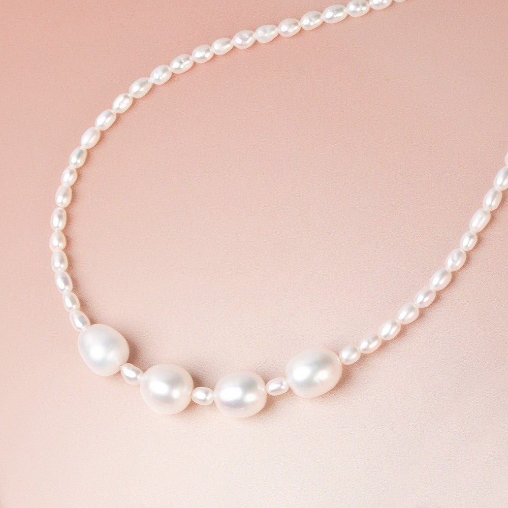 9.5-10mm Off White Oval Freshwater Pearl Set of 4 Beads (ONLINE ORDER ONLY)