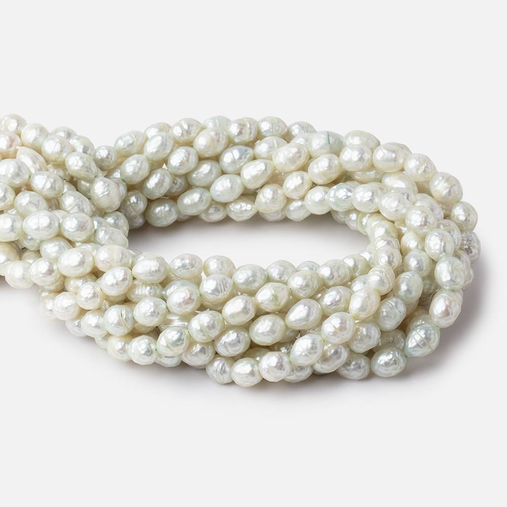 9x7mm Pale Mint Faceted Oval Freshwater Pearls 16 inch 33 pieces (ONLINE ORDER ONLY)