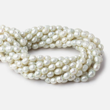 9x7mm Pale Mint Faceted Oval Freshwater Pearls 16 inch 33 pieces (ONLINE ORDER ONLY)