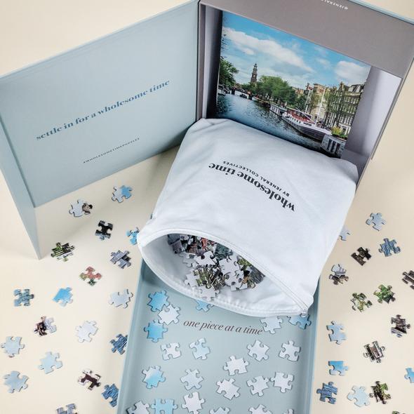 Jeneral Collectives: wholesome times - Amsterdam 1000 Piece Jigsaw Puzzle (ONLINE ORDER ONLY)