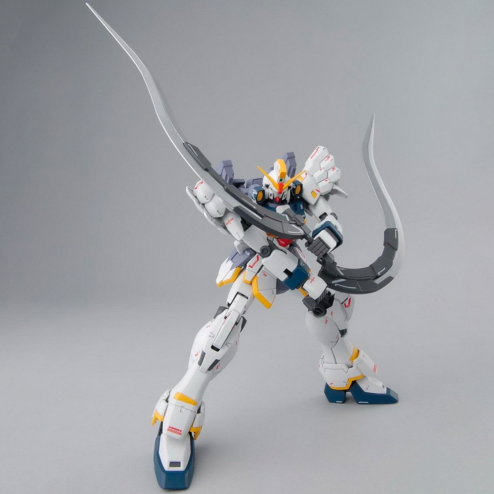 Bandai Spirits: Gundam Wing: Endless Waltz- MG 1/100 Gundam Sandrock (EW Ver.) Model Kit (ONLINE ORDER ONLY)