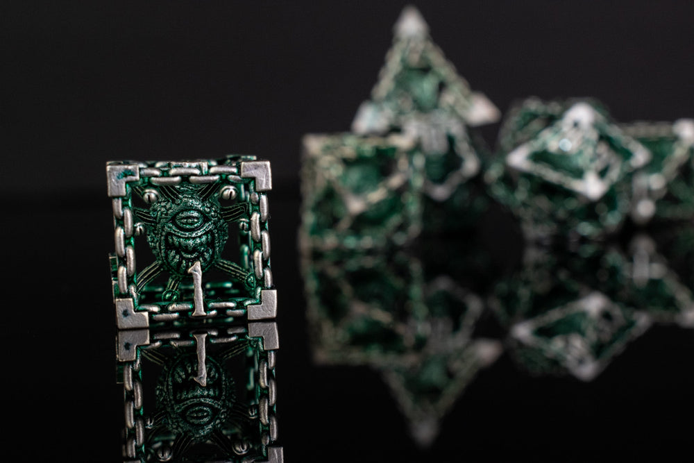 Pre-Order|| Beholder's Gates Hollow Metal Dice Set - Green and Silver