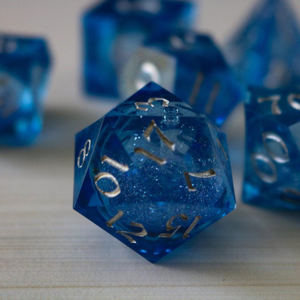 Blue Glitter Liquid Core Sharp Edge Handmade Resin DND Dice Set (ONLINE ORDER ONLY)