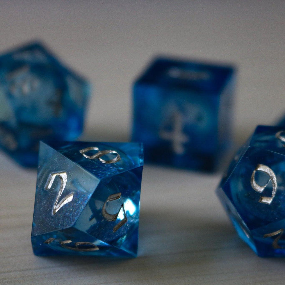 Blue Glitter Liquid Core Sharp Edge Handmade Resin DND Dice Set (ONLINE ORDER ONLY)