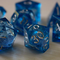 Blue Glitter Liquid Core Sharp Edge Handmade Resin DND Dice Set (ONLINE ORDER ONLY)