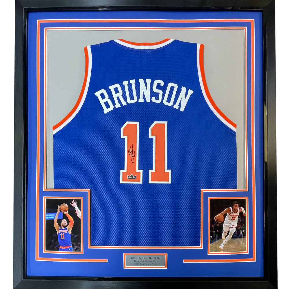 Framed Facsimile Autographed Jalen Brunson 35x39 New York Blue Reprint Laser Auto Basketball Jersey (ONLINE ORDER ONLY)
