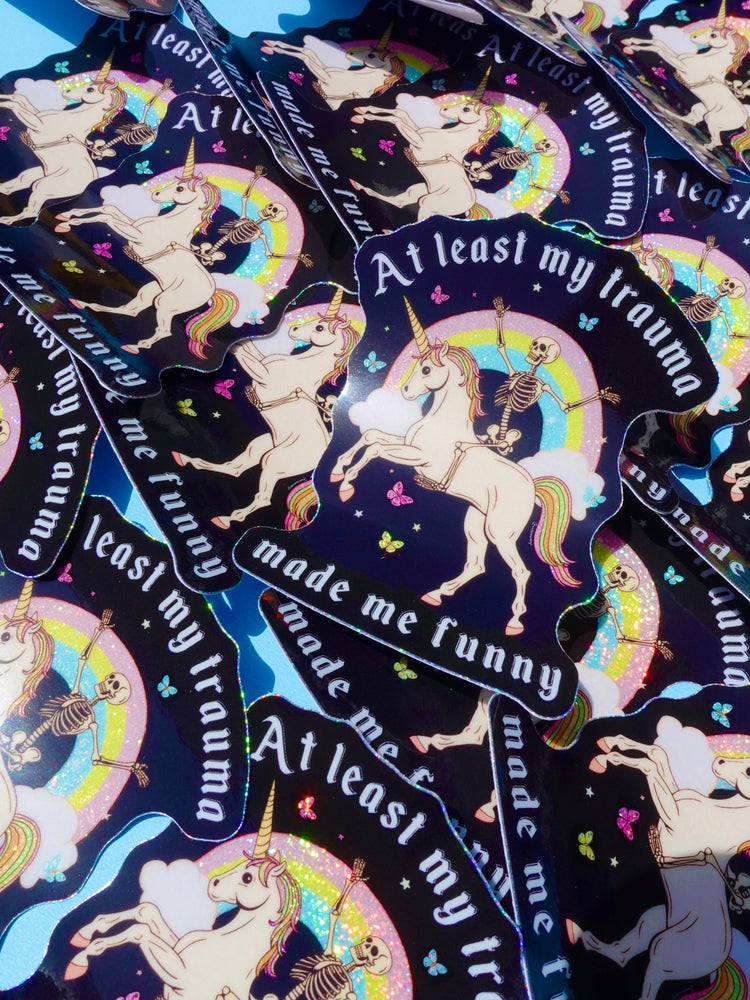 Funny Vinyl Sticker – At Least My Trauma Made Me Funny – Unicorn Skeleton Holographic Decal (Online Order Only)