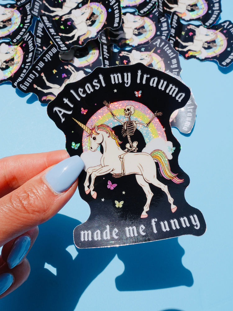 Funny Vinyl Sticker – At Least My Trauma Made Me Funny – Unicorn Skeleton Holographic Decal (Online Order Only)