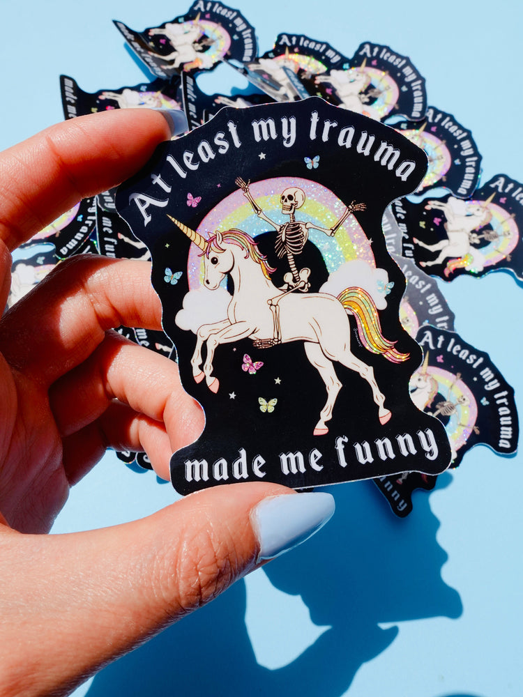 Funny Vinyl Sticker – At Least My Trauma Made Me Funny – Unicorn Skeleton Holographic Decal (Online Order Only)