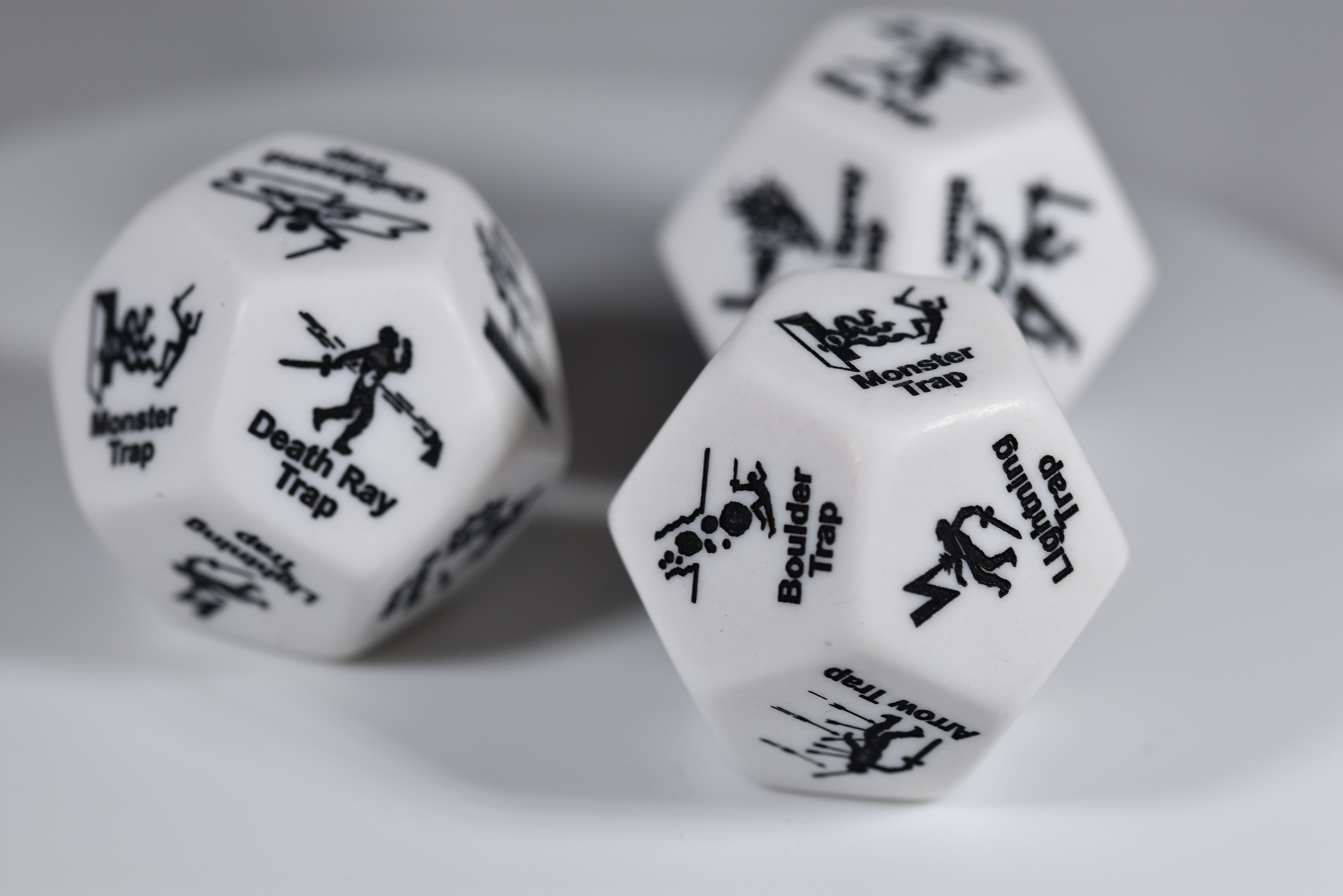 Chessex Opaque White Trap d12 - 28mm Adventure Dice with 12 Unique Traps (Online Only)