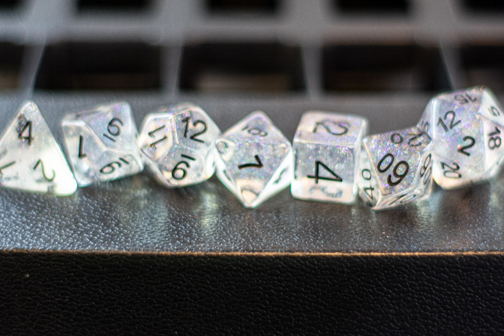 The Time Walker | Clear Glitter 7-Dice Set RPG Dice Set w/Black (Online Only)
