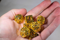 Gold Metal Hollow Gear Dice with Blue Numbers 7-Dice Set (Online Only)