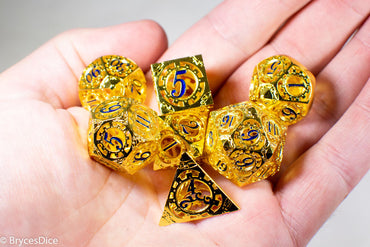 Gold Metal Hollow Gear Dice with Blue Numbers 7-Dice Set (Online Only)