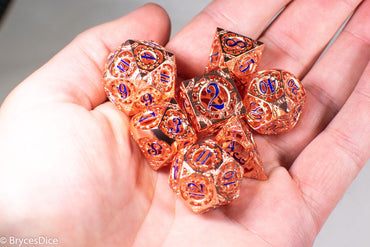 Rose Gold Metal Hollow Gear Dice with Blue Numbers 7-Dice Set (Online Only)