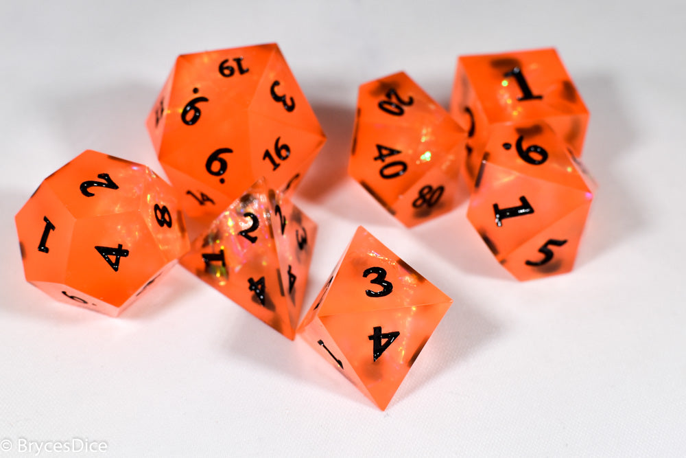 Orangetober Sharp Edge Resin 7-Dice Dice (Orange w/ Black Numbers) (Online Only)