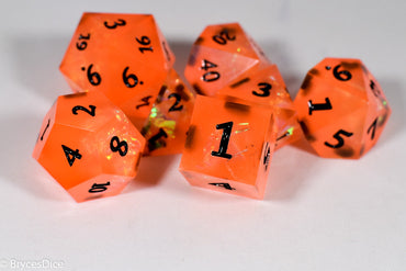 Orangetober Sharp Edge Resin 7-Dice Dice (Orange w/ Black Numbers) (Online Only)