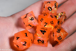 Orangetober Sharp Edge Resin 7-Dice Dice (Orange w/ Black Numbers) (Online Only)