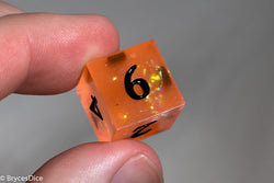 Orangetober Sharp Edge Resin 7-Dice Dice (Orange w/ Black Numbers) (Online Only)