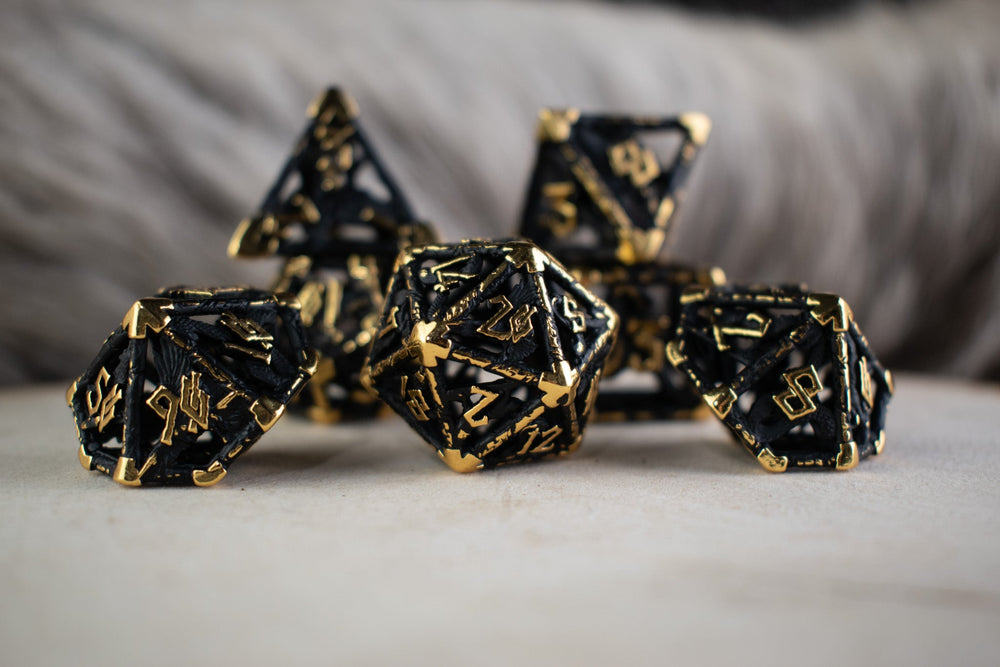 Legends of Valhalla - Matte Black and Gold Hollow Metal Dice Set (ONLINE ORDER ONLY)