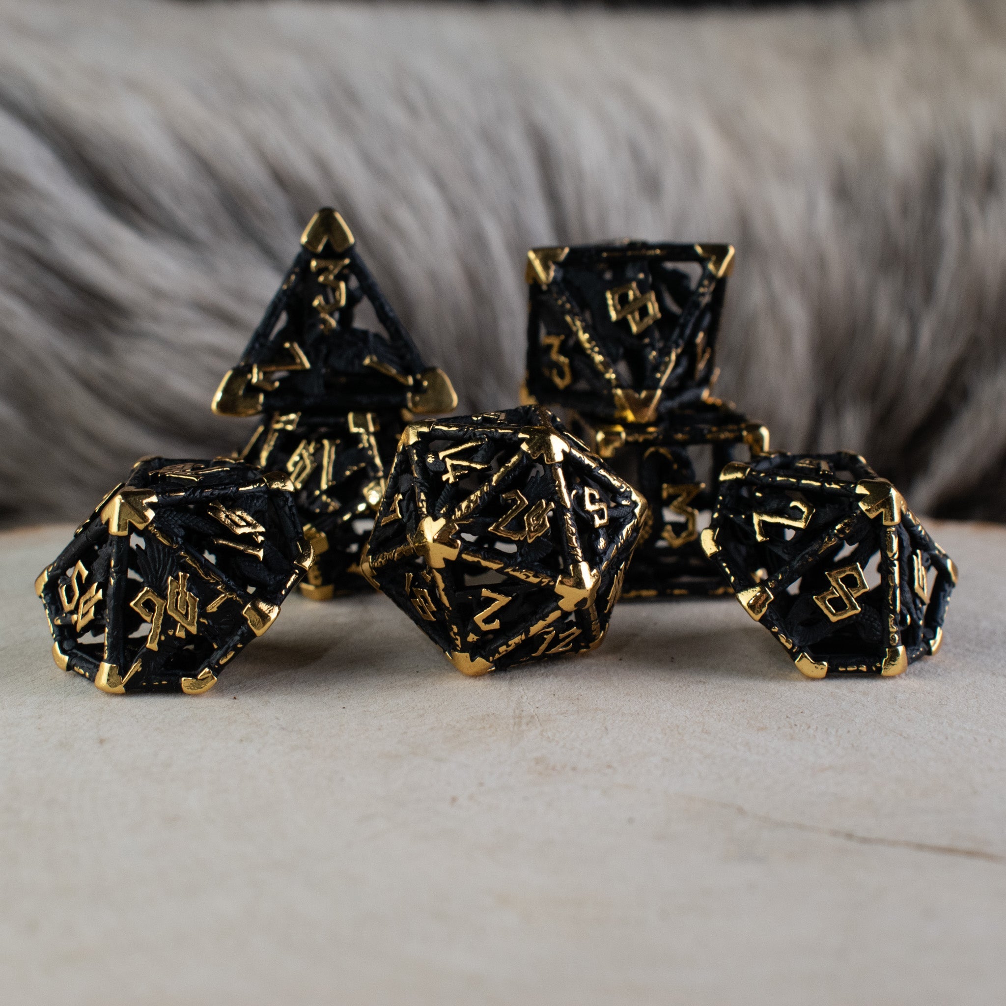 Legends of Valhalla - Matte Black and Gold Hollow Metal Dice Set (ONLINE ORDER ONLY)