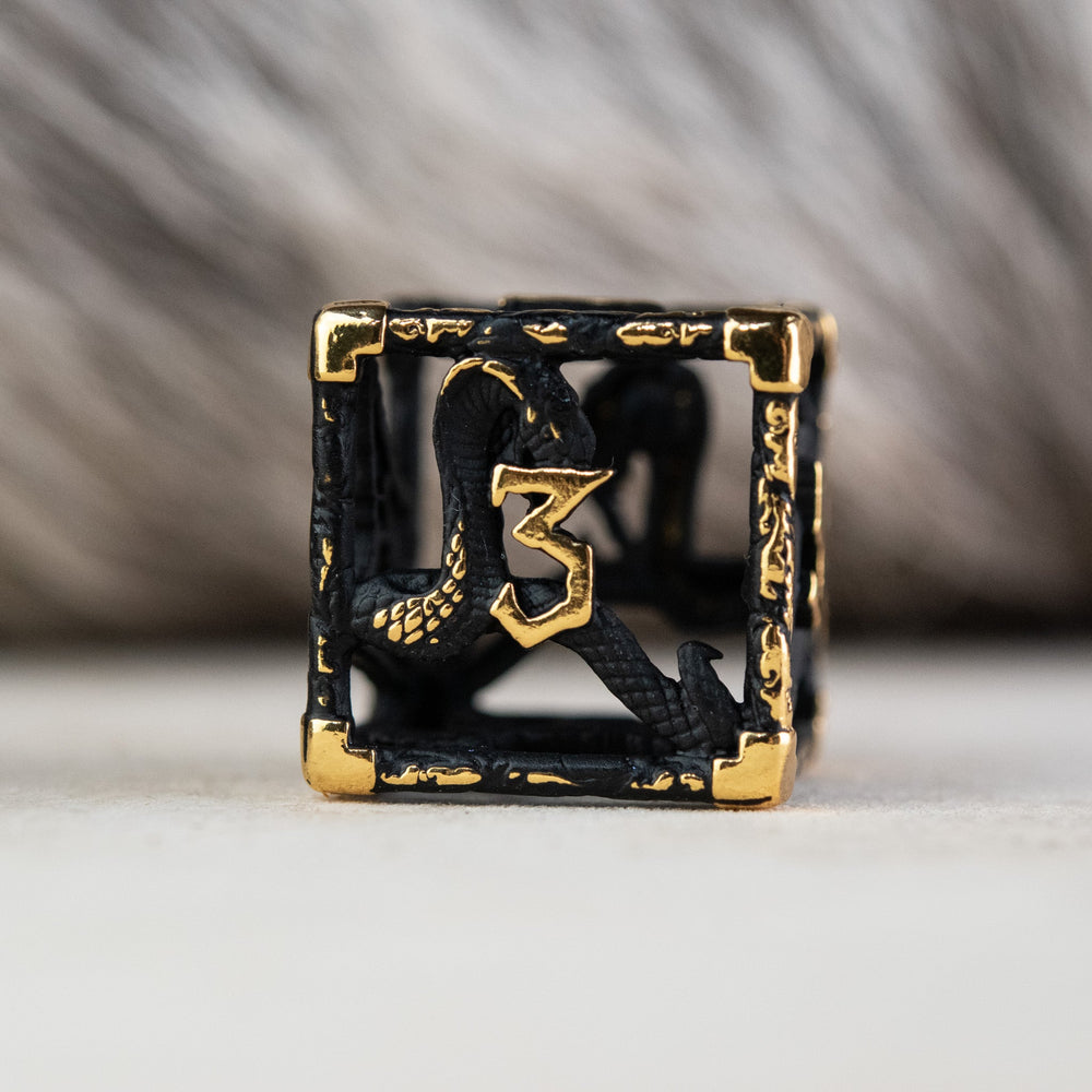 Legends of Valhalla - Matte Black and Gold Hollow Metal Dice Set (ONLINE ORDER ONLY)