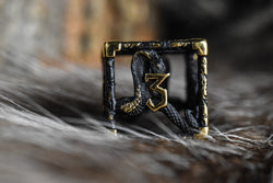 Legends of Valhalla - Matte Black and Gold Hollow Metal Dice Set (ONLINE ORDER ONLY)