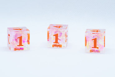 Nectar Sharp Edge Resin d6-Dice (Clear Shimmer w/ Orange Numbers) [subtle imperfection] (Online Only)