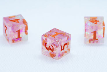 Nectar Sharp Edge Resin d6-Dice (Clear Shimmer w/ Orange Numbers) [subtle imperfection] (Online Only)