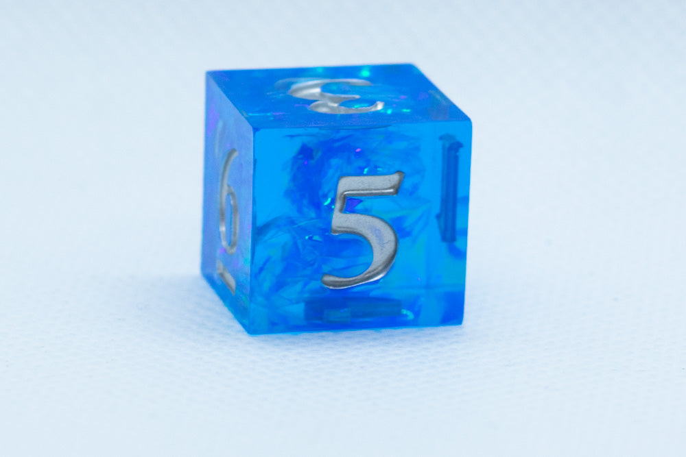 Powder Blue Sharp Edge Resin d6-Dice (Blue w/Silver Numbers) [subtle imperfection] (Online Only)