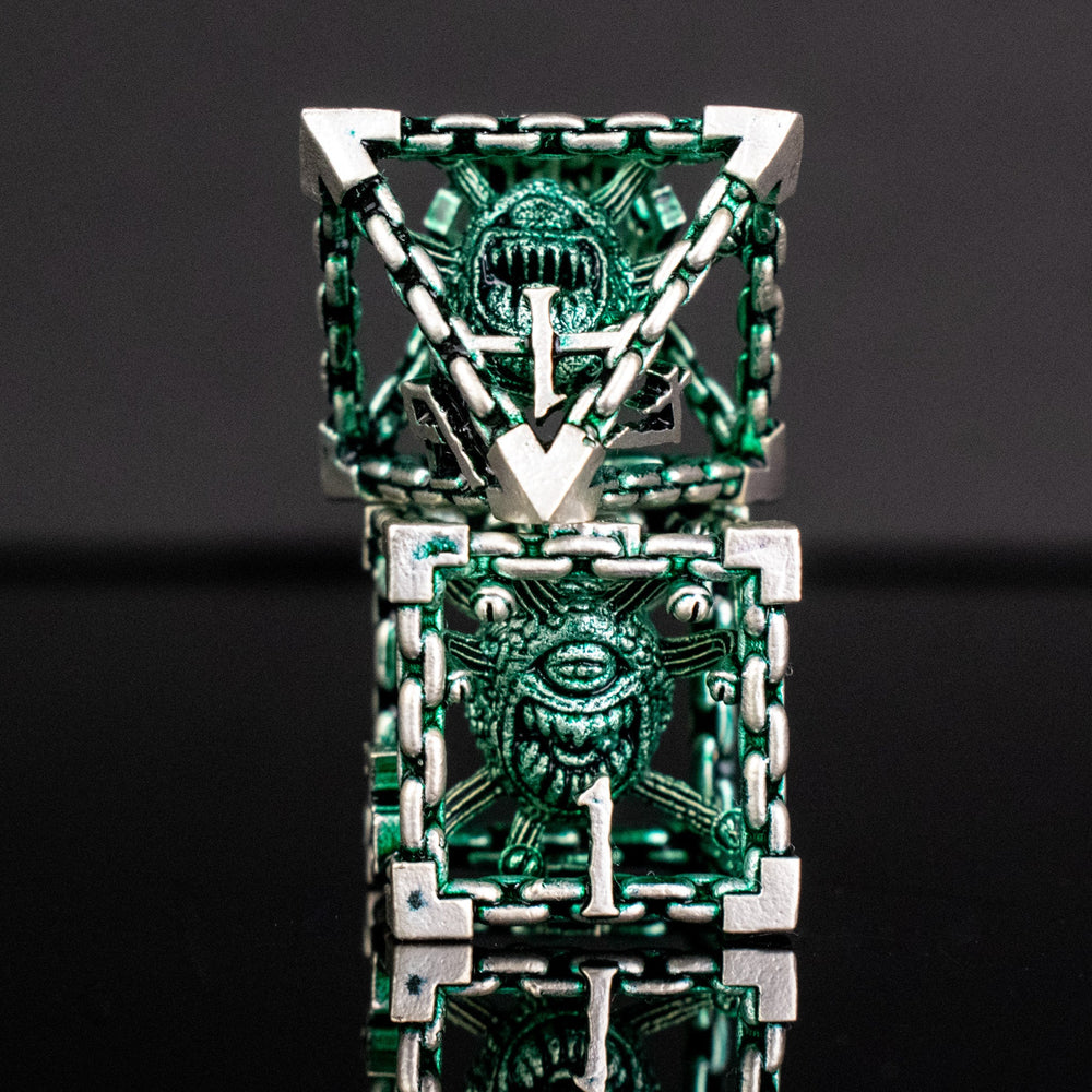 Beholder's Gates Hollow Metal Dice Set - Green and Silver (ONLINE ORDER ONLY)