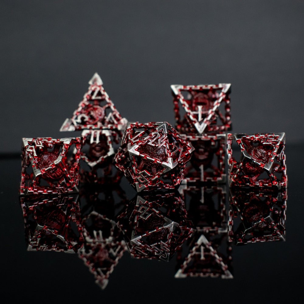 Beholder's Gates Hollow Metal Dice Set - Bloodied Silver (ONLINE ORDER ONLY)