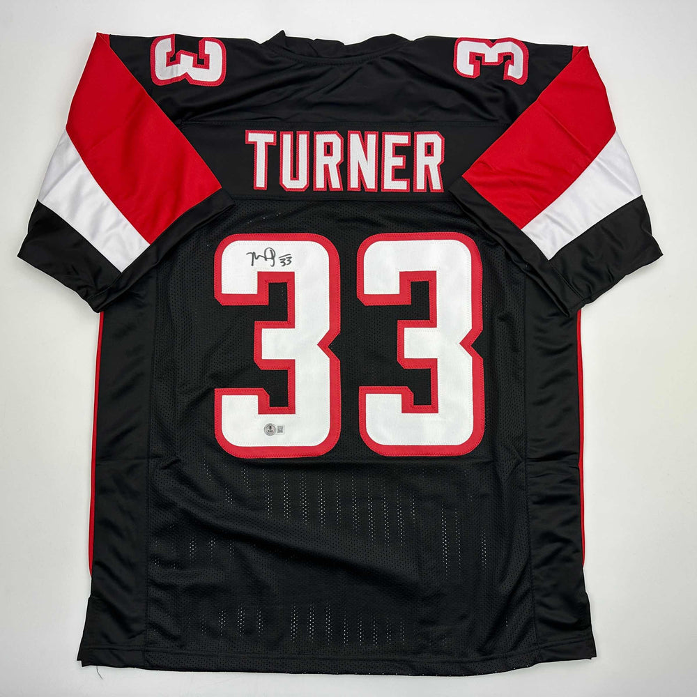 Autographed/Signed Michael Turner Atlanta Black Football Jersey Beckett BAS COA (ONLINE ORDER ONLY)