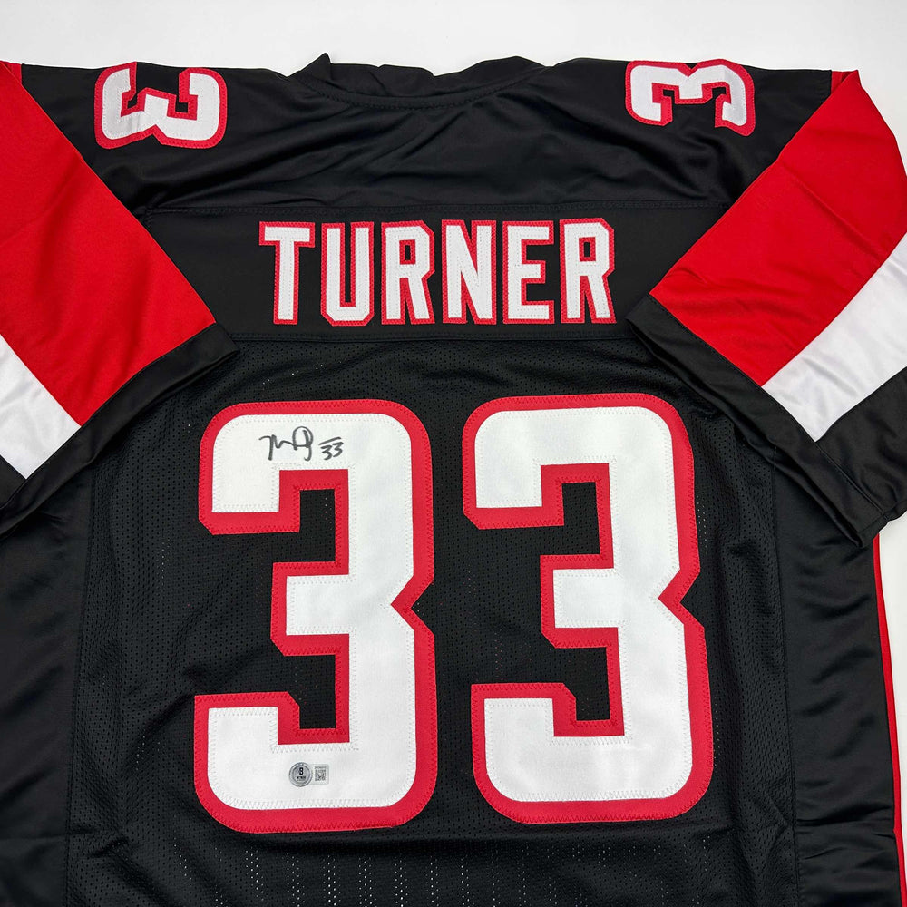 Autographed/Signed Michael Turner Atlanta Black Football Jersey Beckett BAS COA (ONLINE ORDER ONLY)