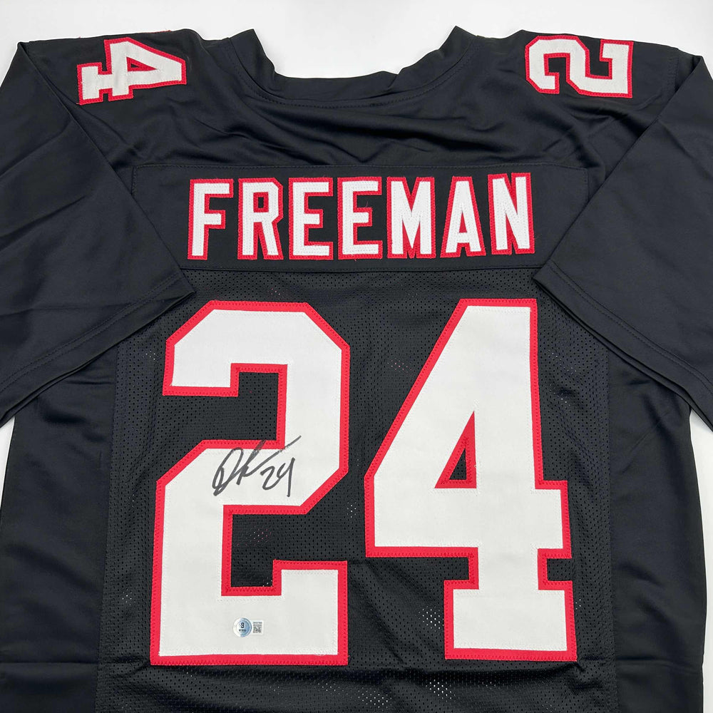 Autographed/Signed Devonta Freeman Atlanta Retro Black Football Jersey Beckett BAS COA (ONLINE ORDER ONLY)