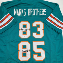 Autographed/Signed Marks Brothers Mark Clayton & Mark Duper Miami Teal Football Jersey JSA COA (ONLINE ORDER ONLY)