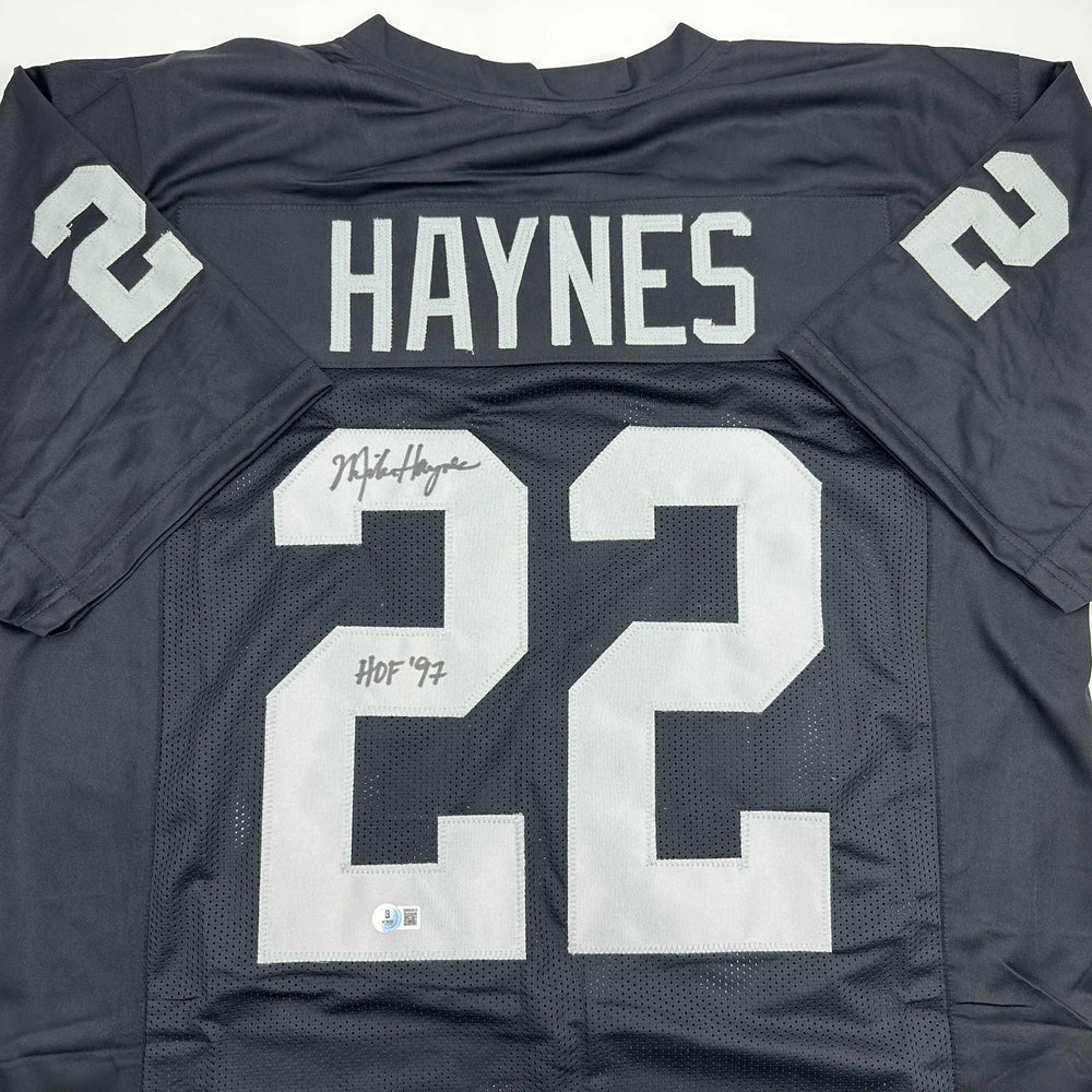 Autographed/Signed Michael Haynes HOF 97 Oakland Black Football Jersey Beckett BAS COA (ONLINE ORDER ONLY)