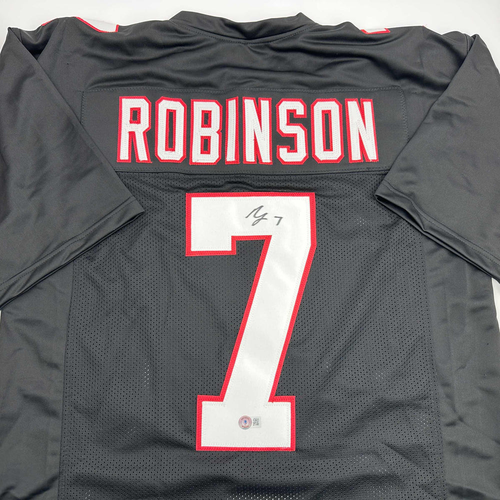 Autographed/Signed Bijan Robinson Atlanta Retro Black Football Jersey Beckett BAS COA (ONLINE ORDER ONLY)